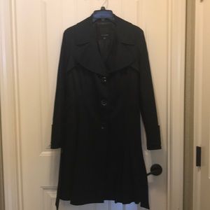 Stunning black fit and flair Limited trench coat!